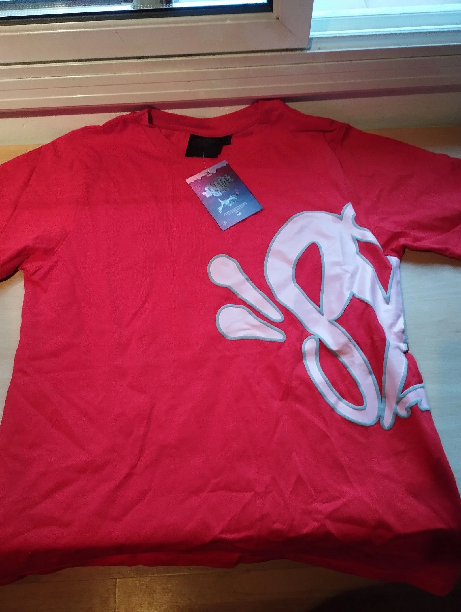 Syna world t shirt 